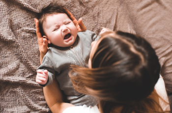 Dit betekenen de verschillende huiltjes van je baby